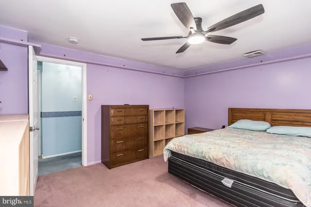 a view of a road with tall buildings