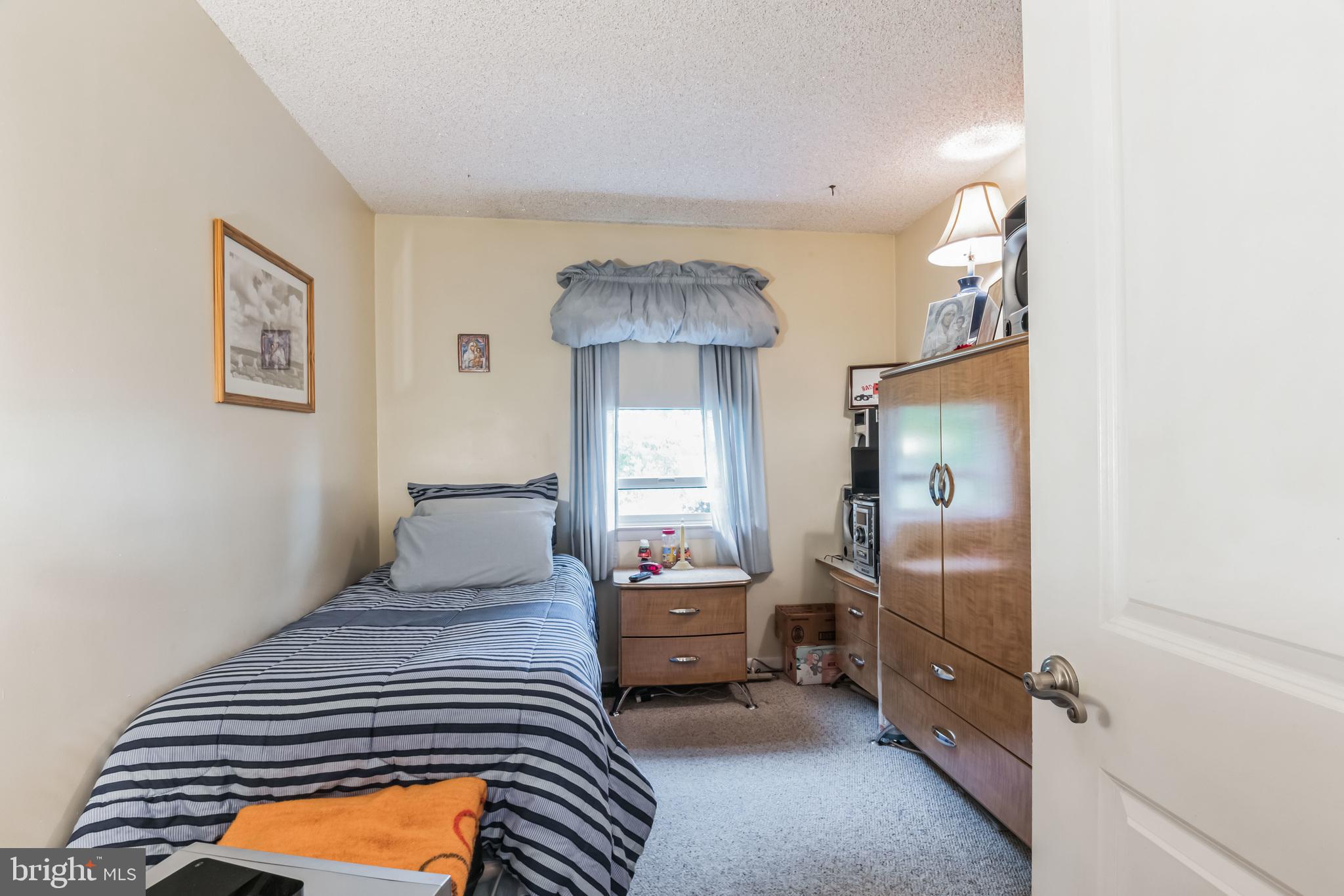 219 Forked Neck Road Shamong, NJ 08088 - Photo 14 of 26 a bedroom with a bed and a window