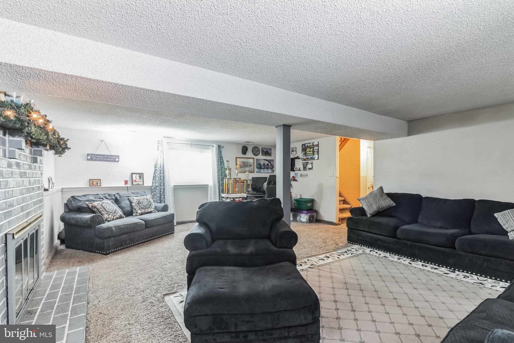 219 Forked Neck Road Shamong, NJ 08088 - Photo 18 of 26 a living room with furniture and a couch