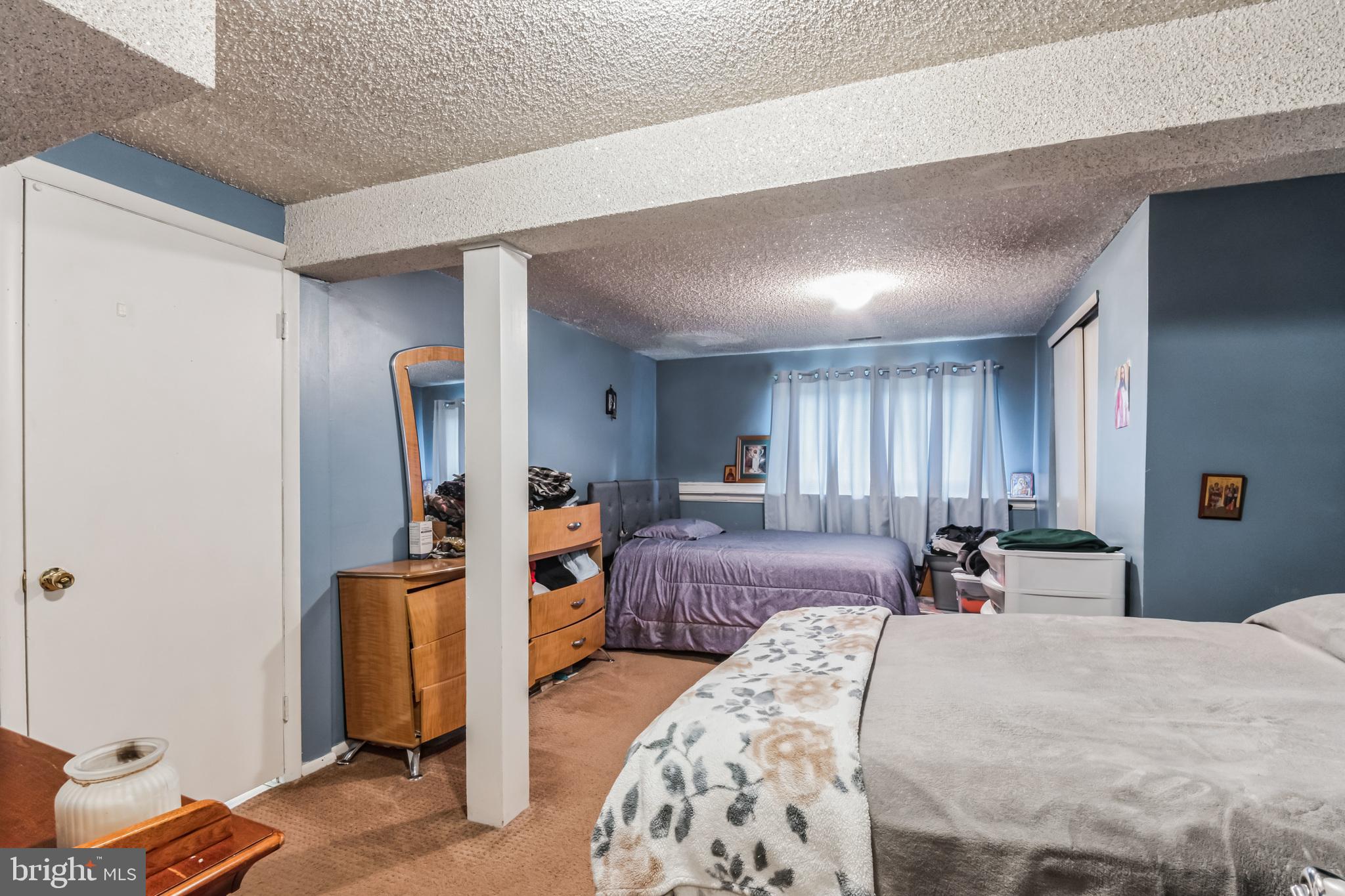 219 Forked Neck Road Shamong, NJ 08088 - Photo 21 of 26 a bed room with a bed and a chair
