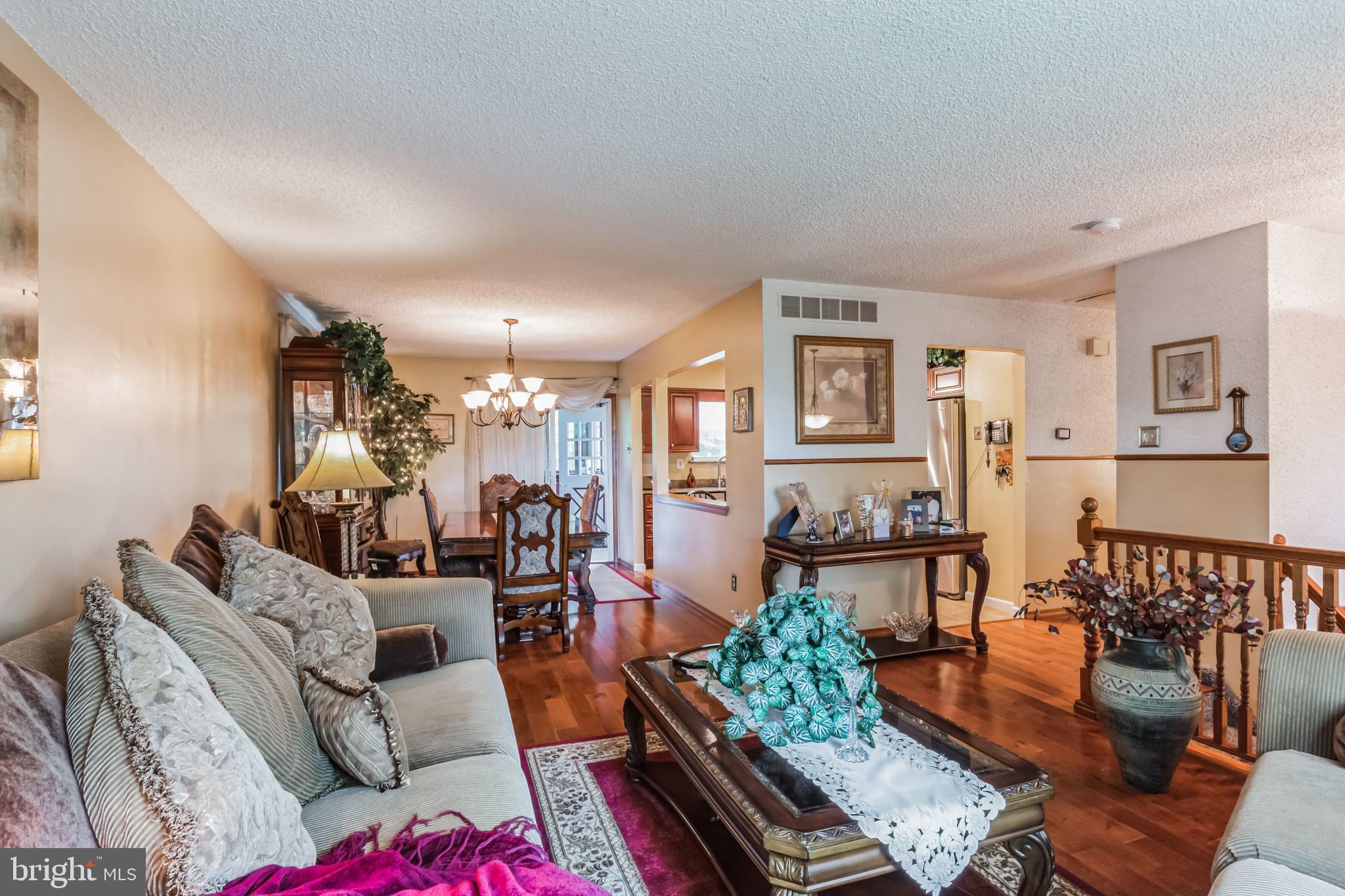 219 Forked Neck Road Shamong, NJ 08088 - Photo 4 of 26 a living room with furniture and wooden floor