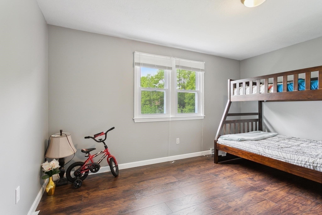 164 Nashua Road Pepperell, MA 01463 - Photo 12 of 28 a bedroom with a bed and a window