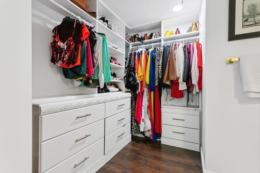 164 Nashua Road Pepperell, MA 01463 - Photo 17 of 28 a view of walk in closet with clothes