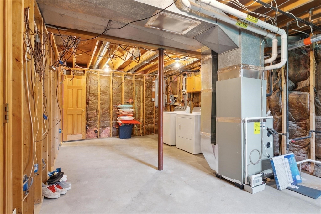164 Nashua Road Pepperell, MA 01463 - Photo 23 of 28 a view of a room with gym equipment