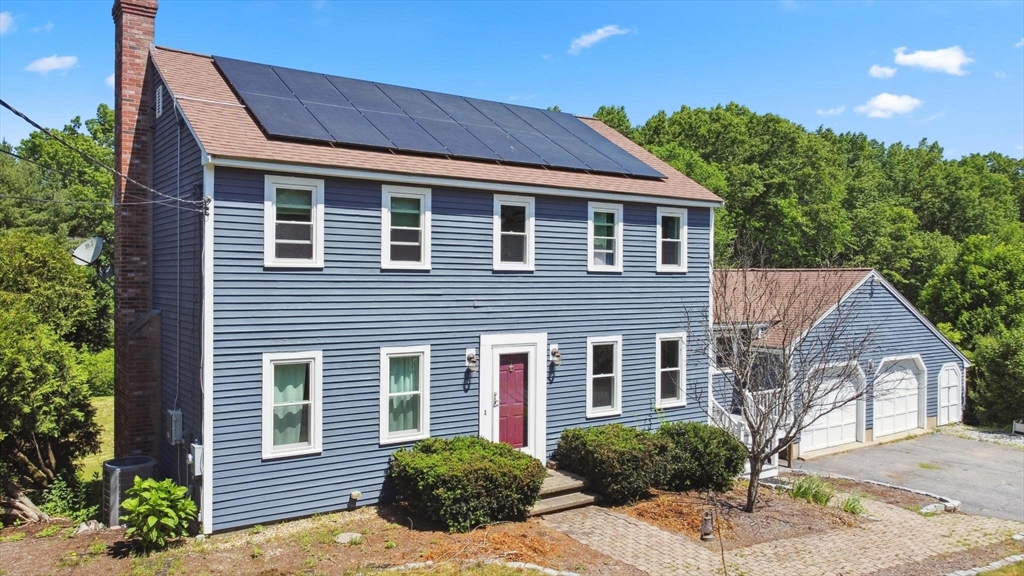 164 Nashua Road Pepperell, MA 01463 - Photo 25 of 28 a front view of a house with a yard