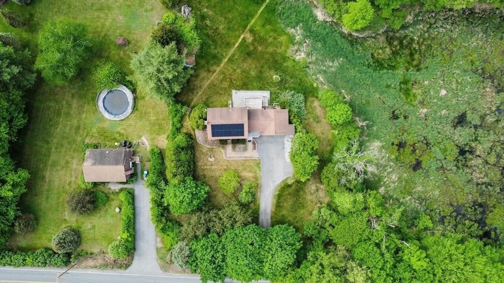 164 Nashua Road Pepperell, MA 01463 - Photo 28 of 28 an aerial view of a house with yard swimming pool and outdoor seating