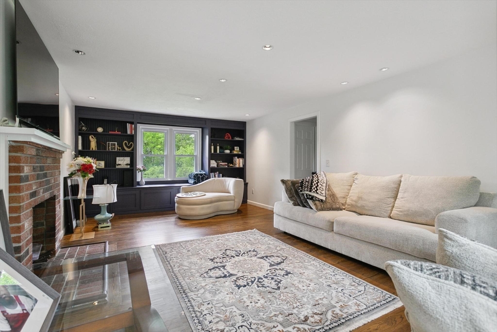 164 Nashua Road Pepperell, MA 01463 - Photo 3 of 28 a living room with furniture and a wooden floor