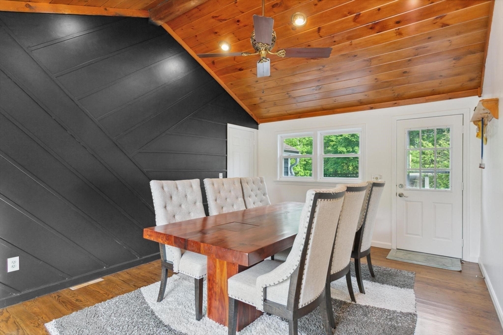 164 Nashua Road Pepperell, MA 01463 - Photo 4 of 28 a view of a dining room with furniture and wooden floor