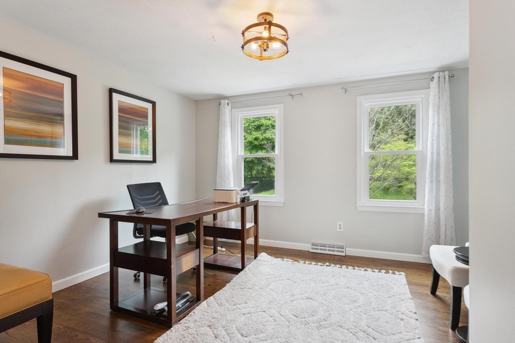 164 Nashua Road Pepperell, MA 01463 - Photo 9 of 28 a view of a workspace with furniture and a window