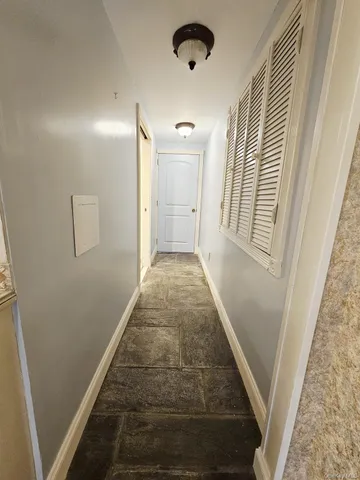 wooden floor with a staircase