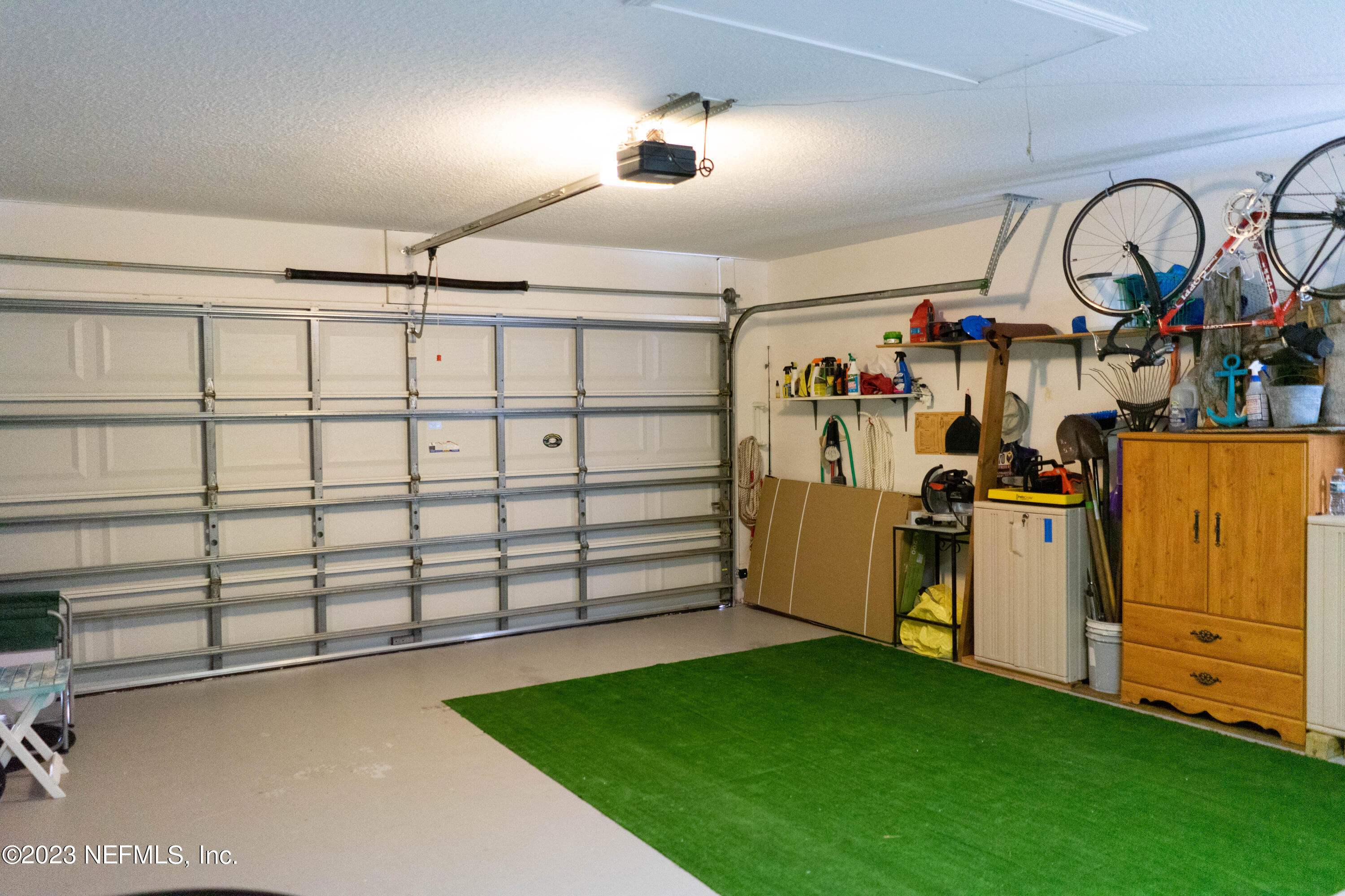 950-952 Irma Way St. Augustine, FL 32086 - Photo 32 of 40 a view of a garage with storage