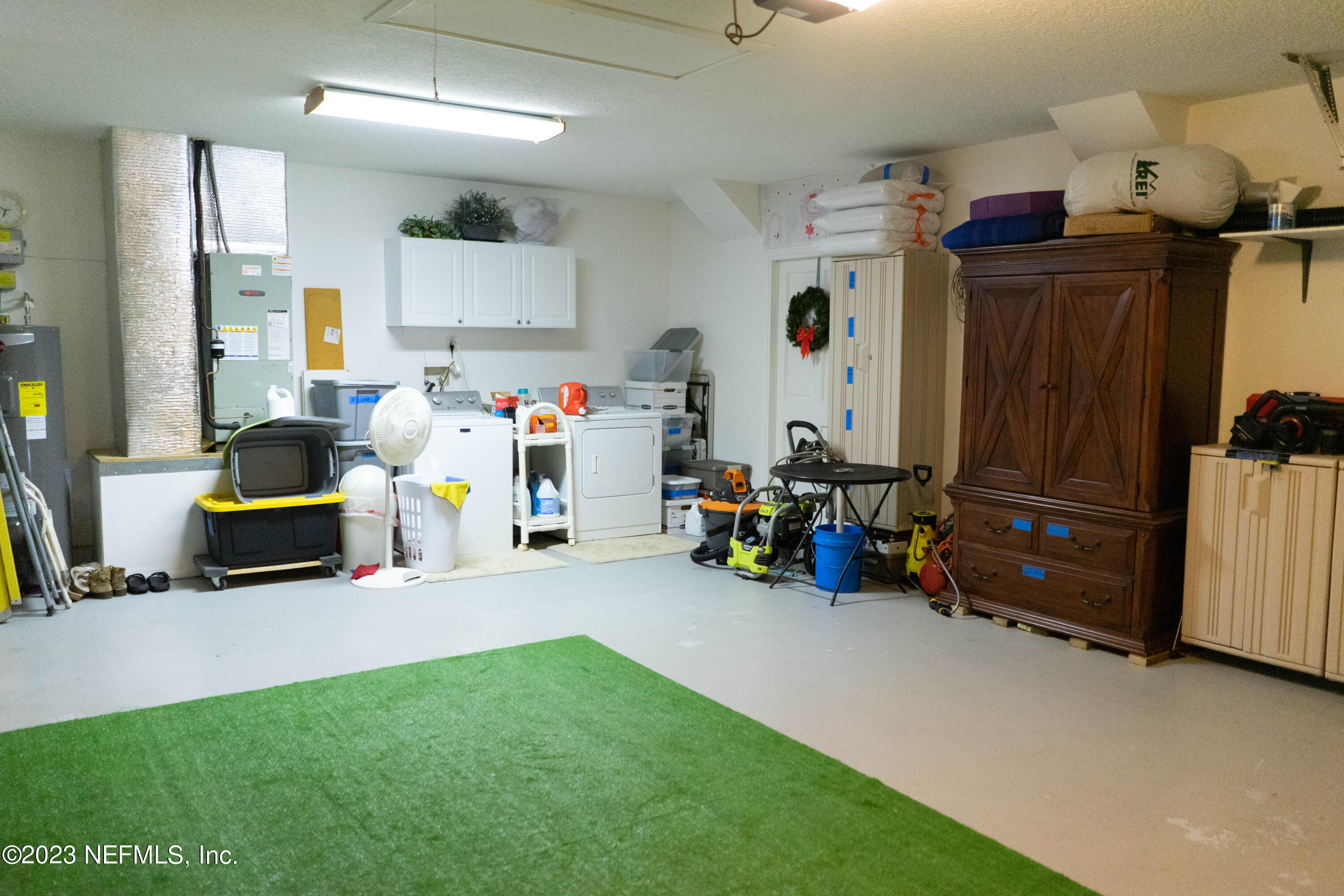 950-952 Irma Way St. Augustine, FL 32086 - Photo 33 of 40 a view of a room with gym equipment and a large window