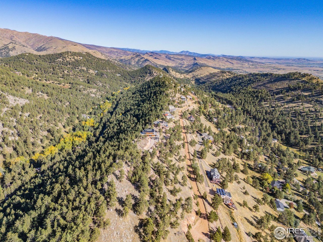 6109 Red Hill Road Boulder, CO 80302 - Photo 21 of 22 a view of a city with mountains in the background