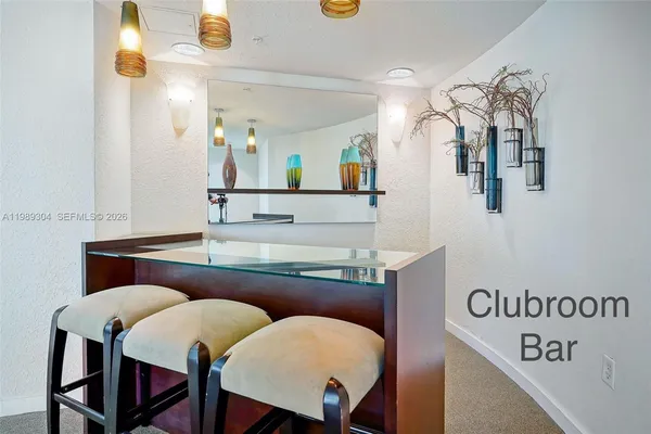 a view of a table and chairs in a room