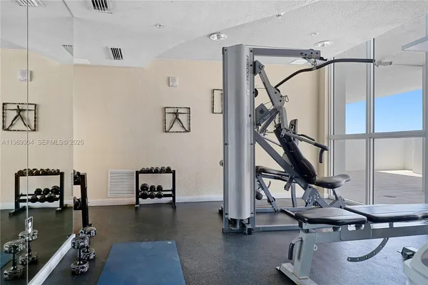 a view of a room with gym equipment