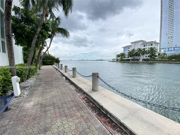 a view of a lake next to a building