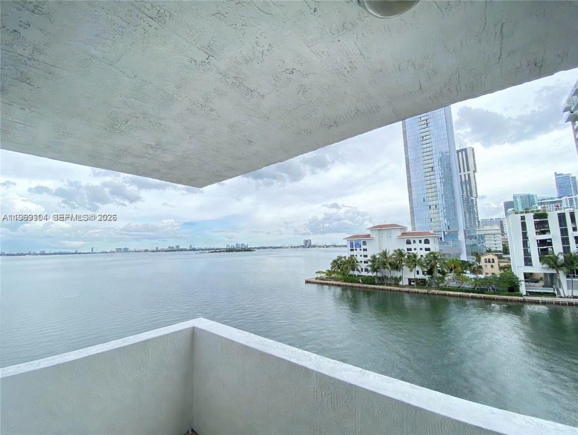 500 Northeast 29th Street, Unit 608 Miami, FL 33137 - Photo 5 of 36 a view of wooden floor with a lake view