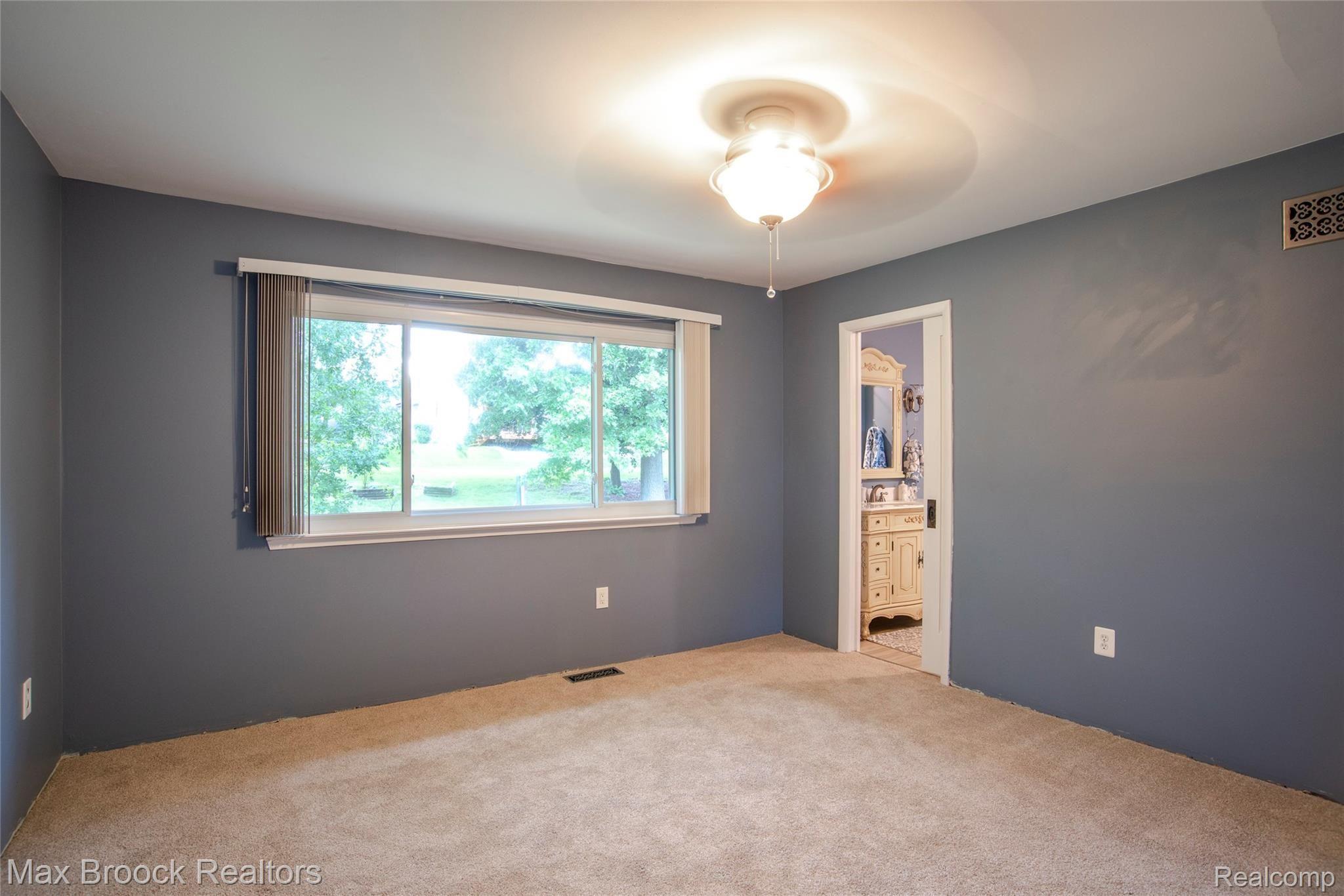 22633 Shadowpine Way Novi, MI 48375 - Photo 20 of 35 Master Bedroom overlooking backyard.