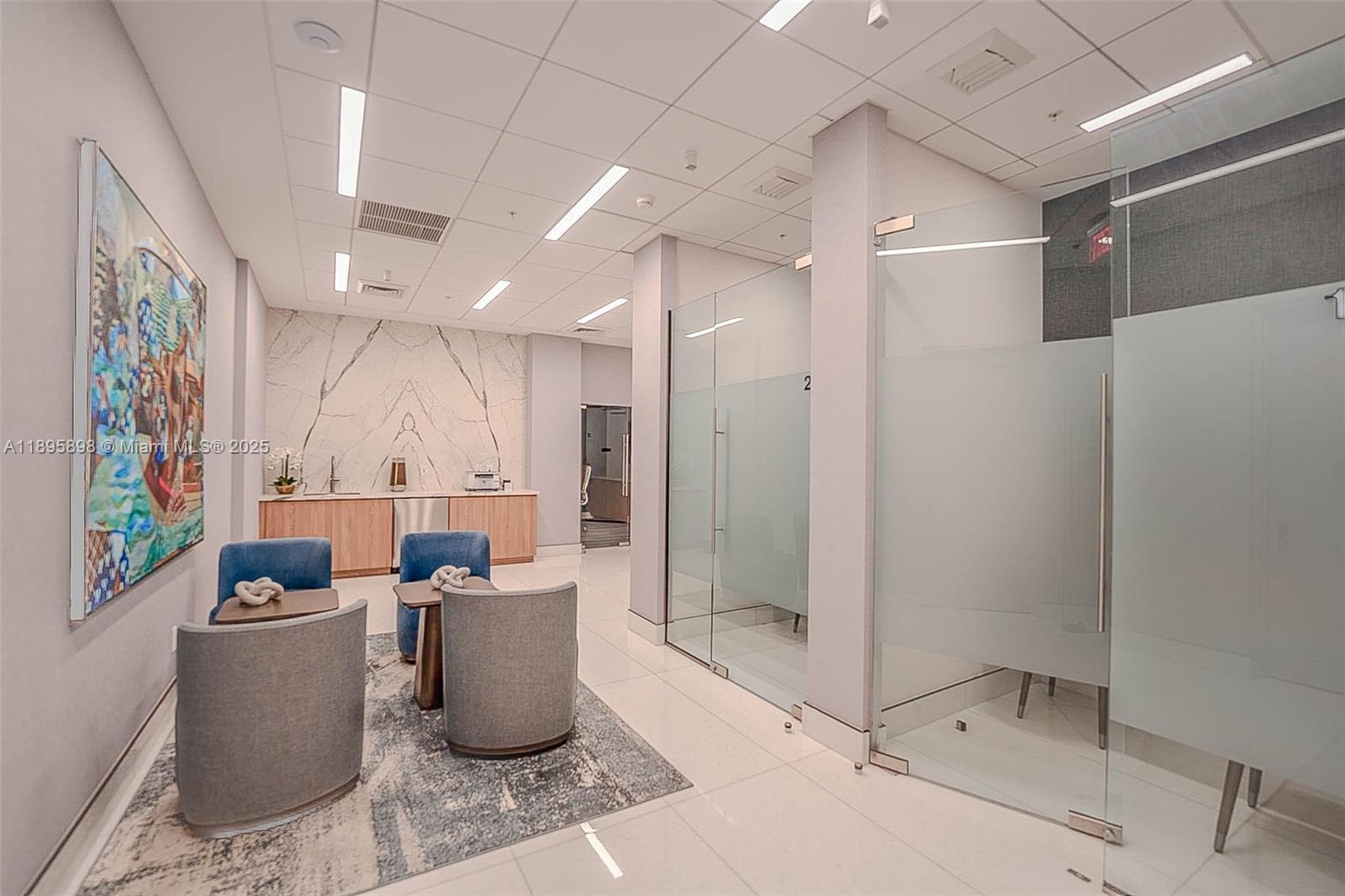 888 Brickell Key Drive, Unit 903 Miami, FL 33131 - Photo 28 of 38 a room with lots of furniture and a shower