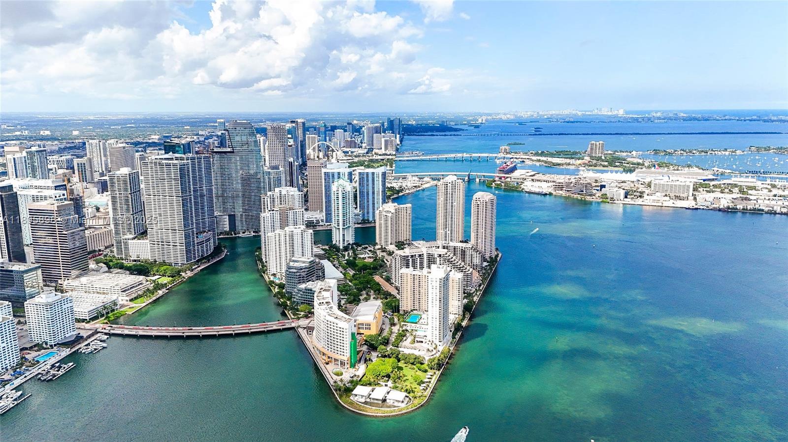 888 Brickell Key Drive, Unit 903 Miami, FL 33131 - Photo 34 of 38 a view of a city with tall buildings