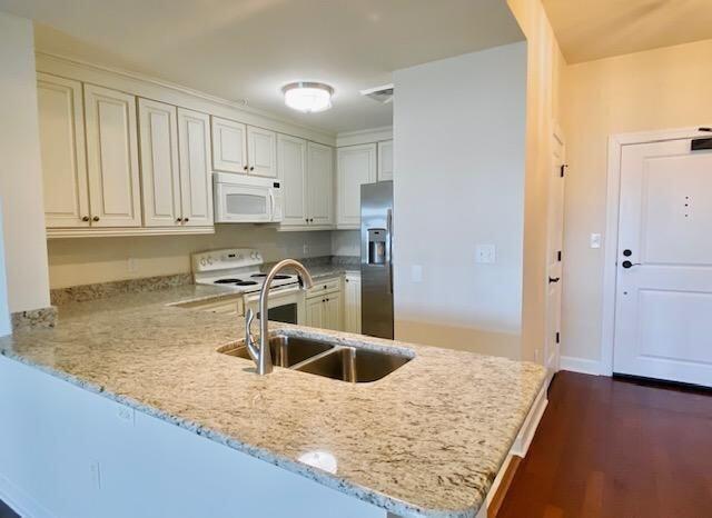 33 Calhoun Street, Unit 236 Charleston, SC 29401 - Photo 8 of 23 Kitchen by front door