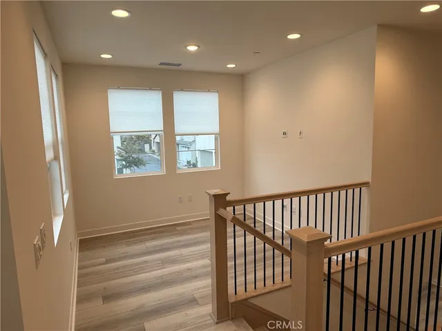 a view of hallway with stairs