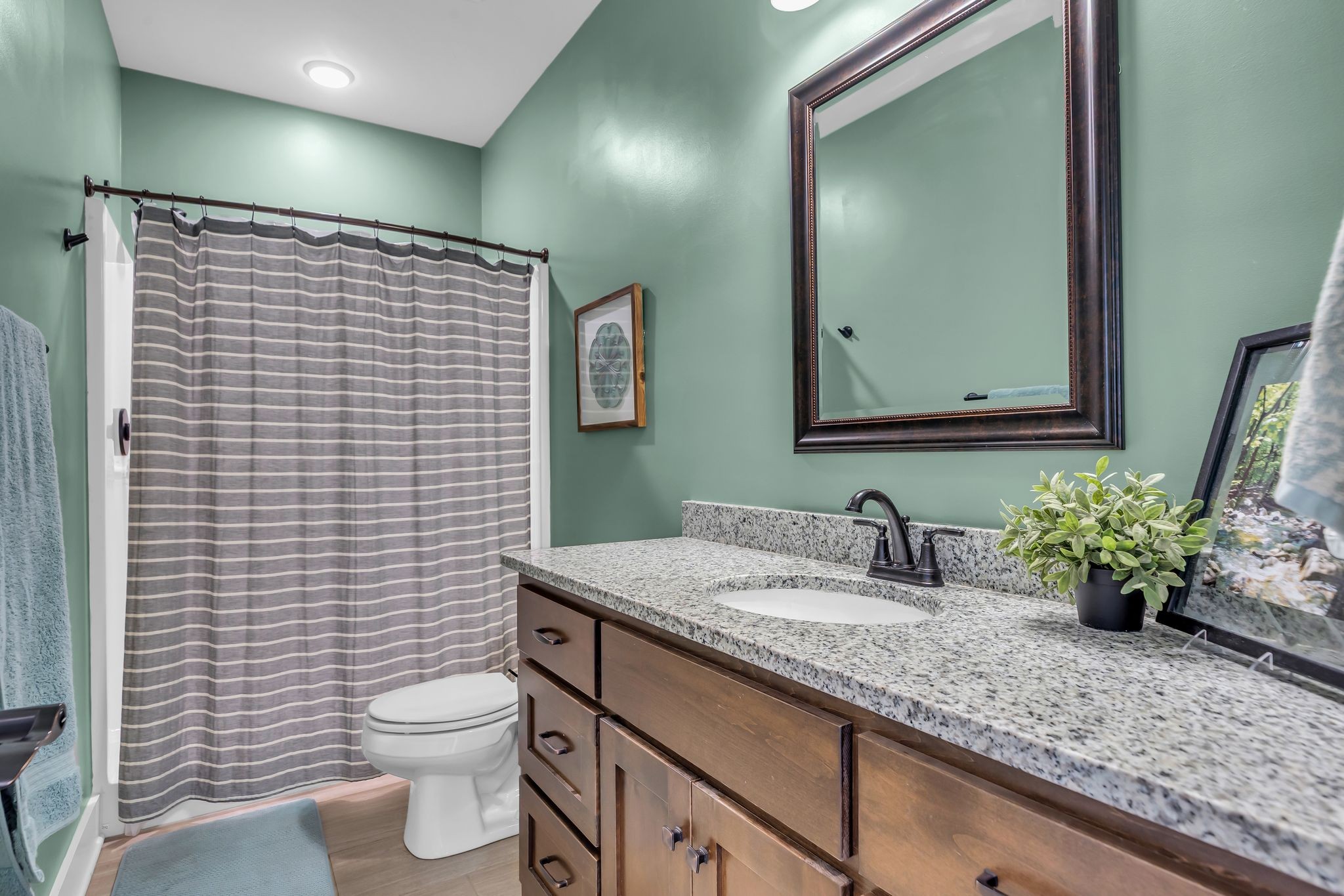 7816 Brenda Lane Murfreesboro, TN 37129 - Photo 15 of 53 a bathroom with a granite countertop sink mirror vanity and toilet