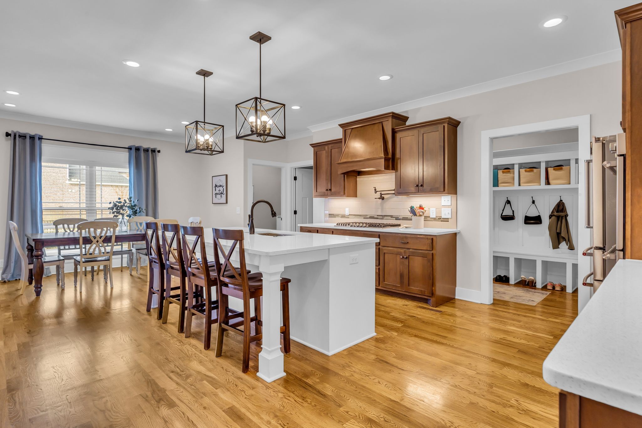 7816 Brenda Lane Murfreesboro, TN 37129 - Photo 32 of 53 a open kitchen with stainless steel appliances granite countertop a stove refrigerator dining table and chairs