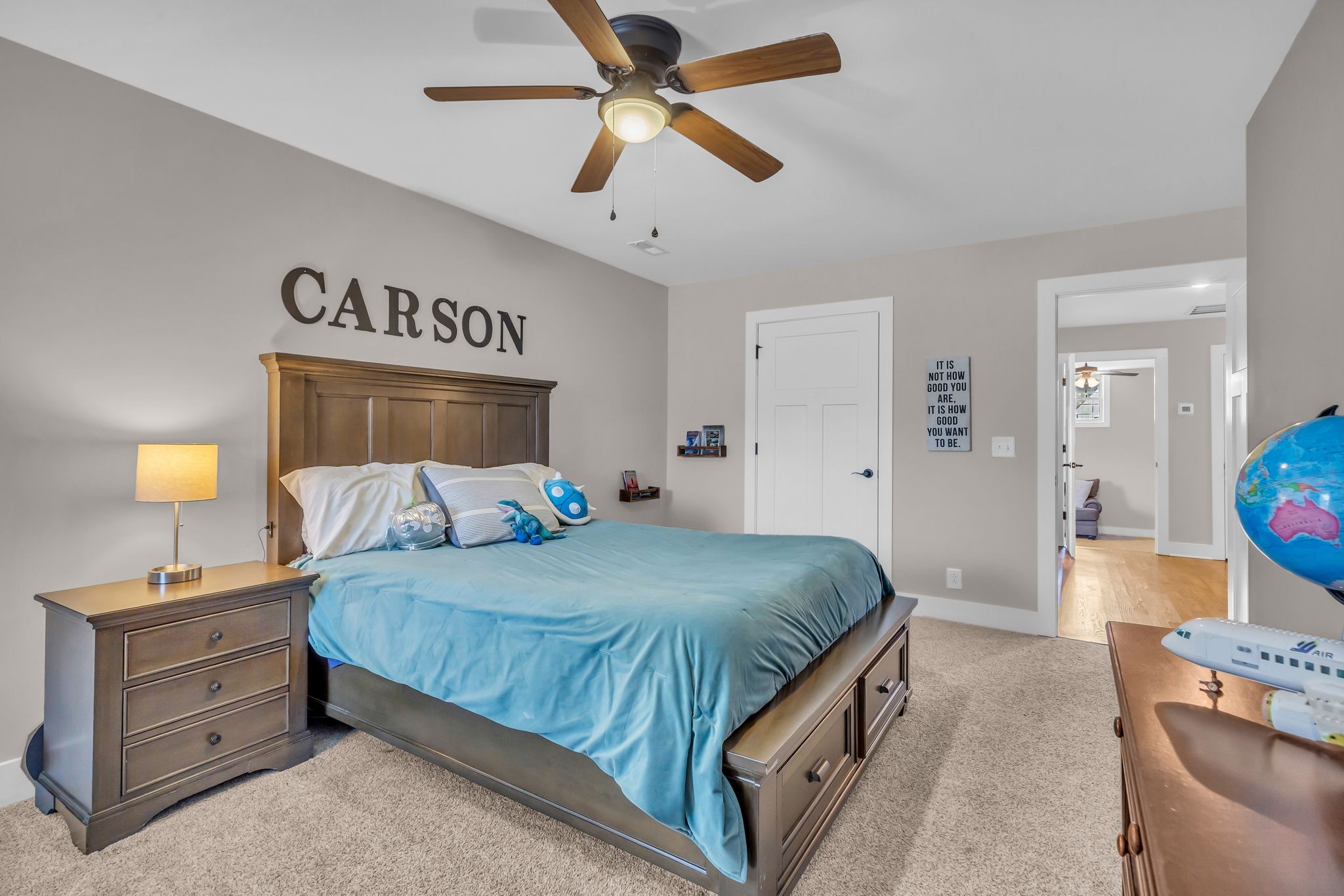 7816 Brenda Lane Murfreesboro, TN 37129 - Photo 44 of 53 a bedroom with a bed and a chandelier