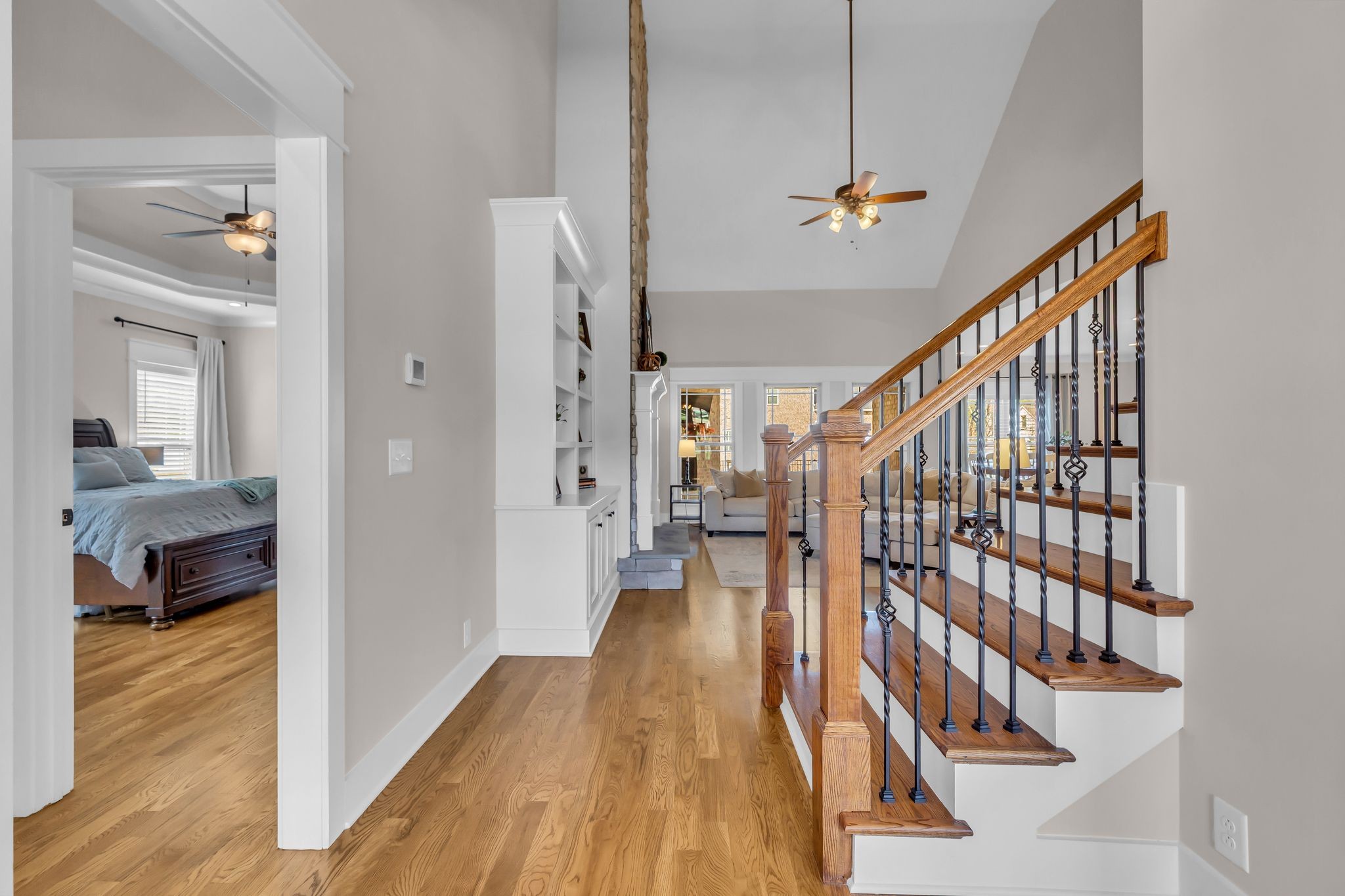 7816 Brenda Lane Murfreesboro, TN 37129 - Photo 9 of 53 a view of a hallway with wooden floor and furniture