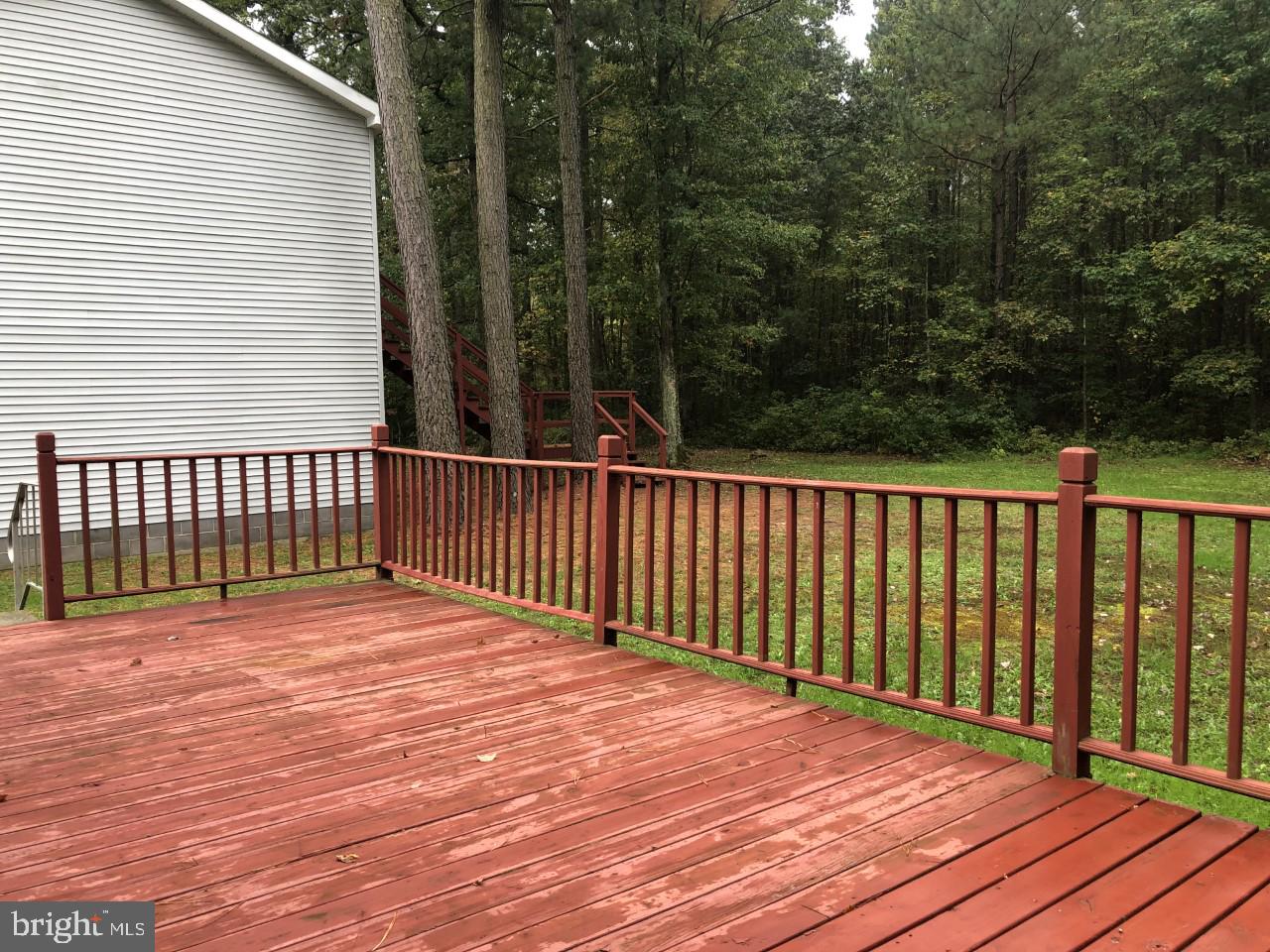 11510 Pine Pole Road Princess Anne, MD 21853 - Photo 29 of 44 From side deck to back garage stairs