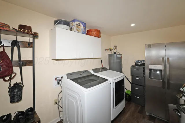 a bathroom with a granite countertop sink a mirror and a vanity