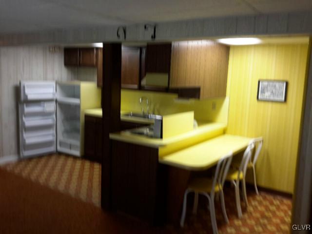 38 Ridgewood Road Easton, PA 18045 - Photo 21 of 33 a view of a dining room with furniture and wooden floor