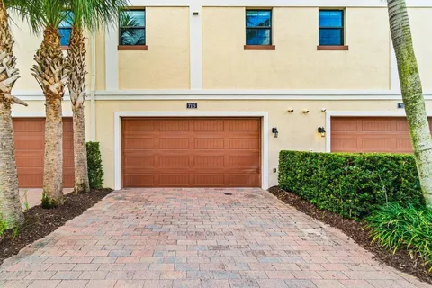 a view of a building with a yard