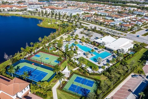 a view of a park and palm trees