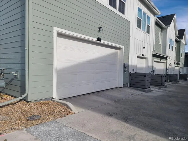 a view of a house with a garage