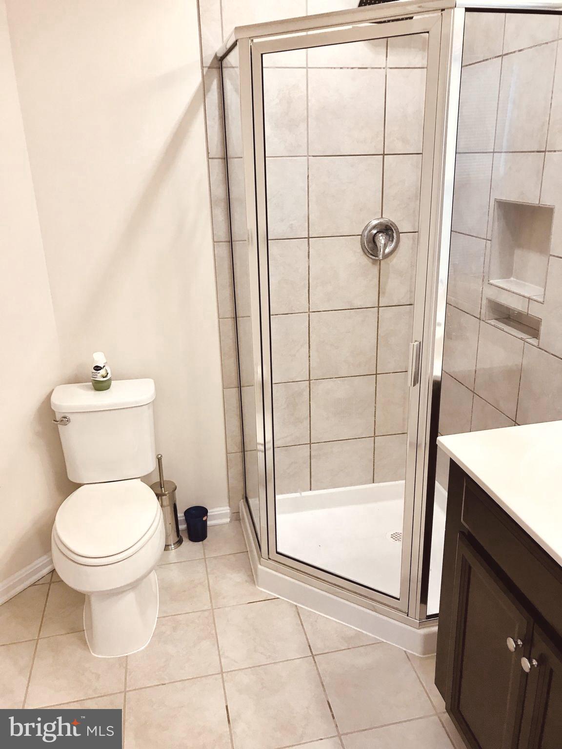 4713 Cambria Road Frederick, MD 21703 - Photo 17 of 67 a bathroom with a toilet and a shower