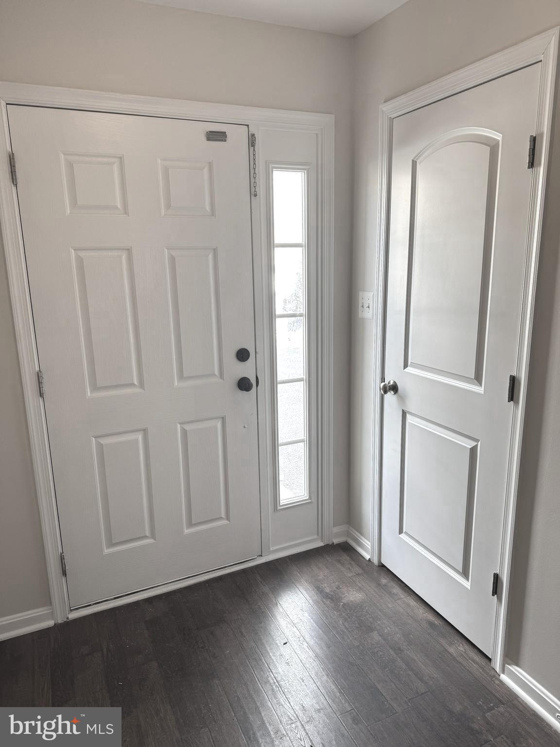 4713 Cambria Road Frederick, MD 21703 - Photo 27 of 67 an empty room with wooden floor and mirror