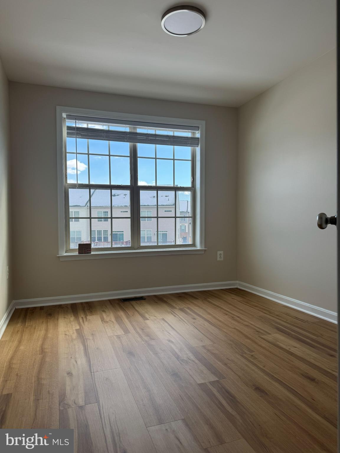 4713 Cambria Road Frederick, MD 21703 - Photo 33 of 67 wooden floor in an empty room with a window