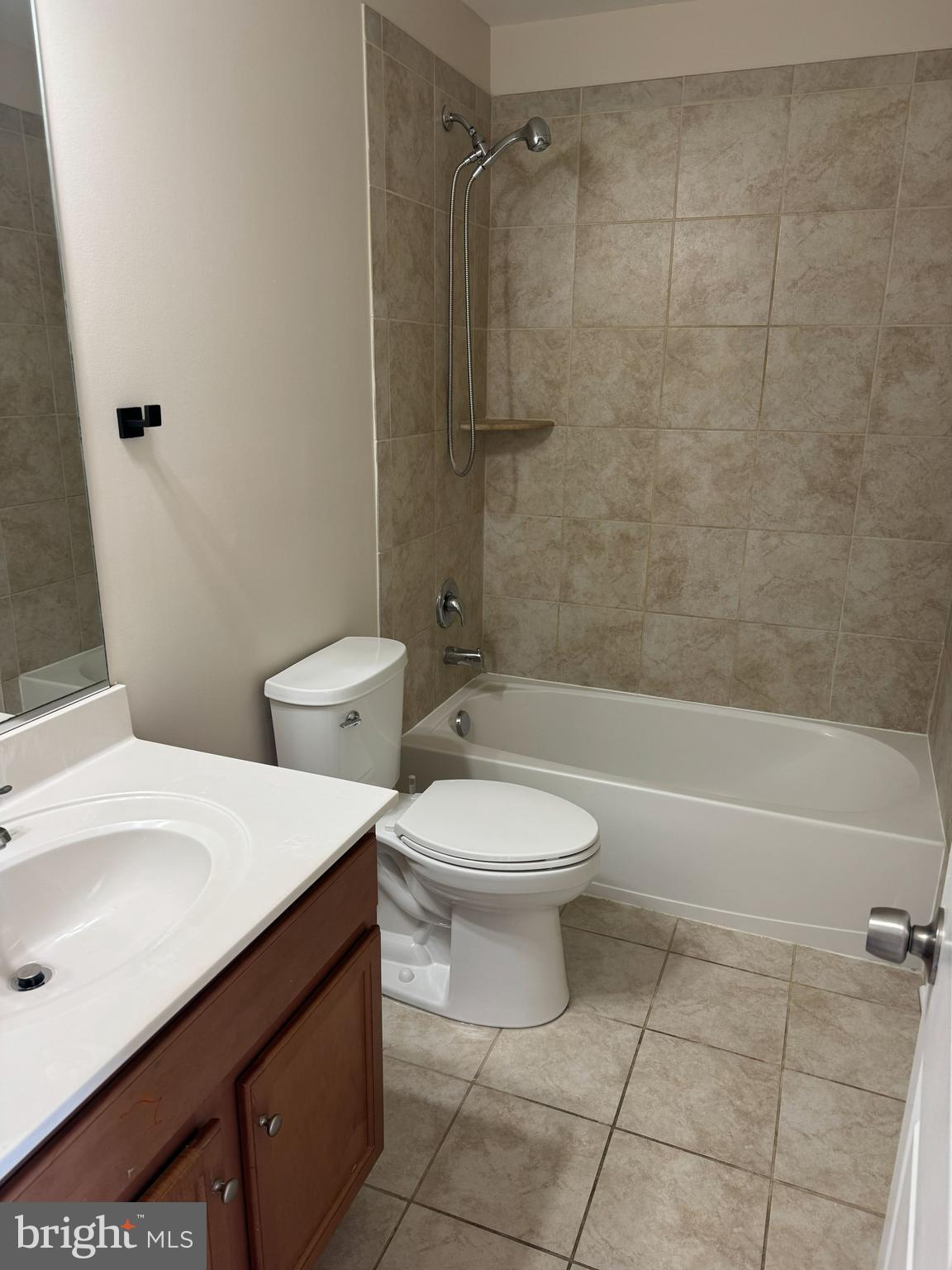 4713 Cambria Road Frederick, MD 21703 - Photo 37 of 67 a bathroom with a toilet a sink and a shower