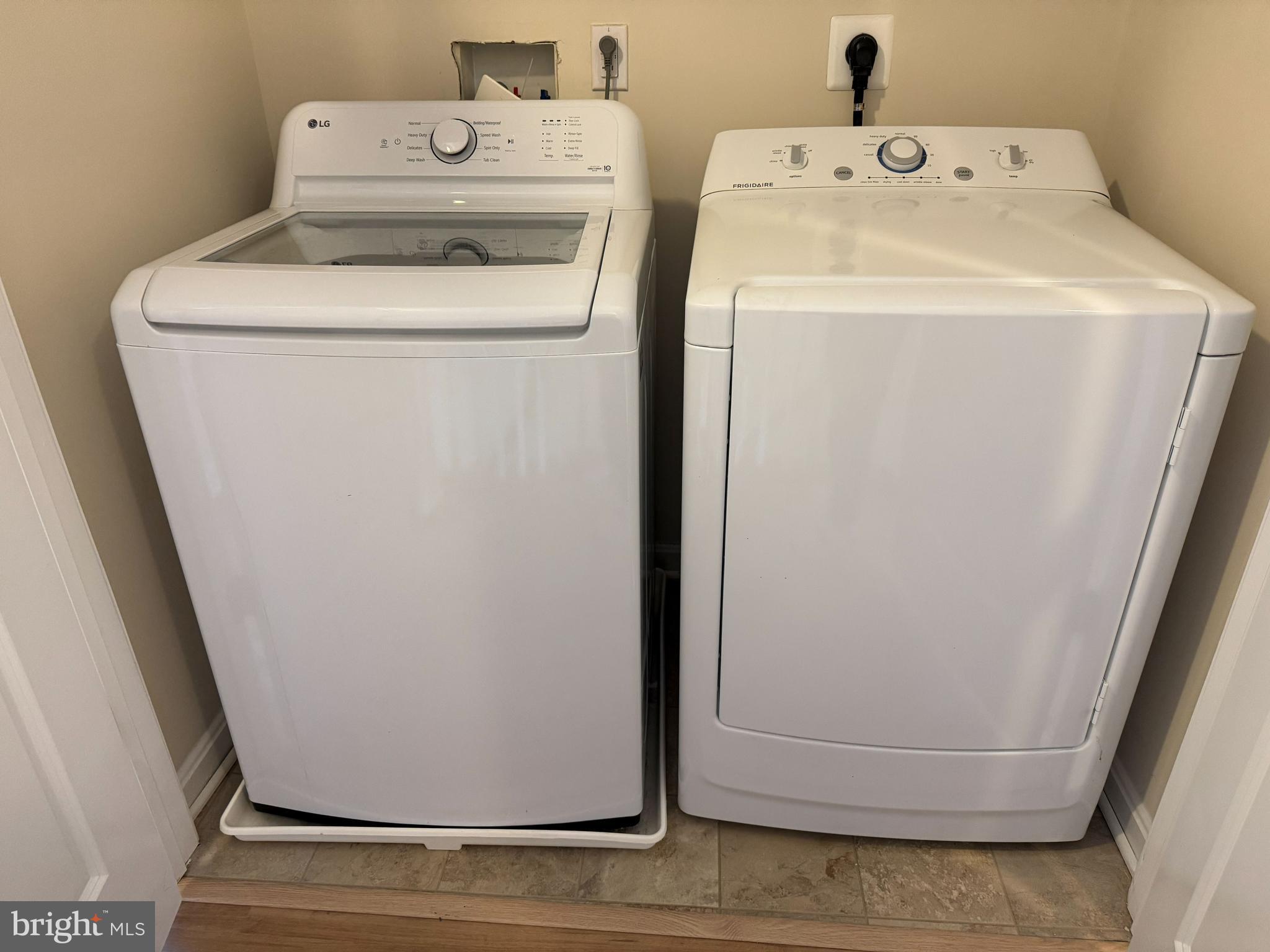 4713 Cambria Road Frederick, MD 21703 - Photo 50 of 67 a utility room with dryer and washer