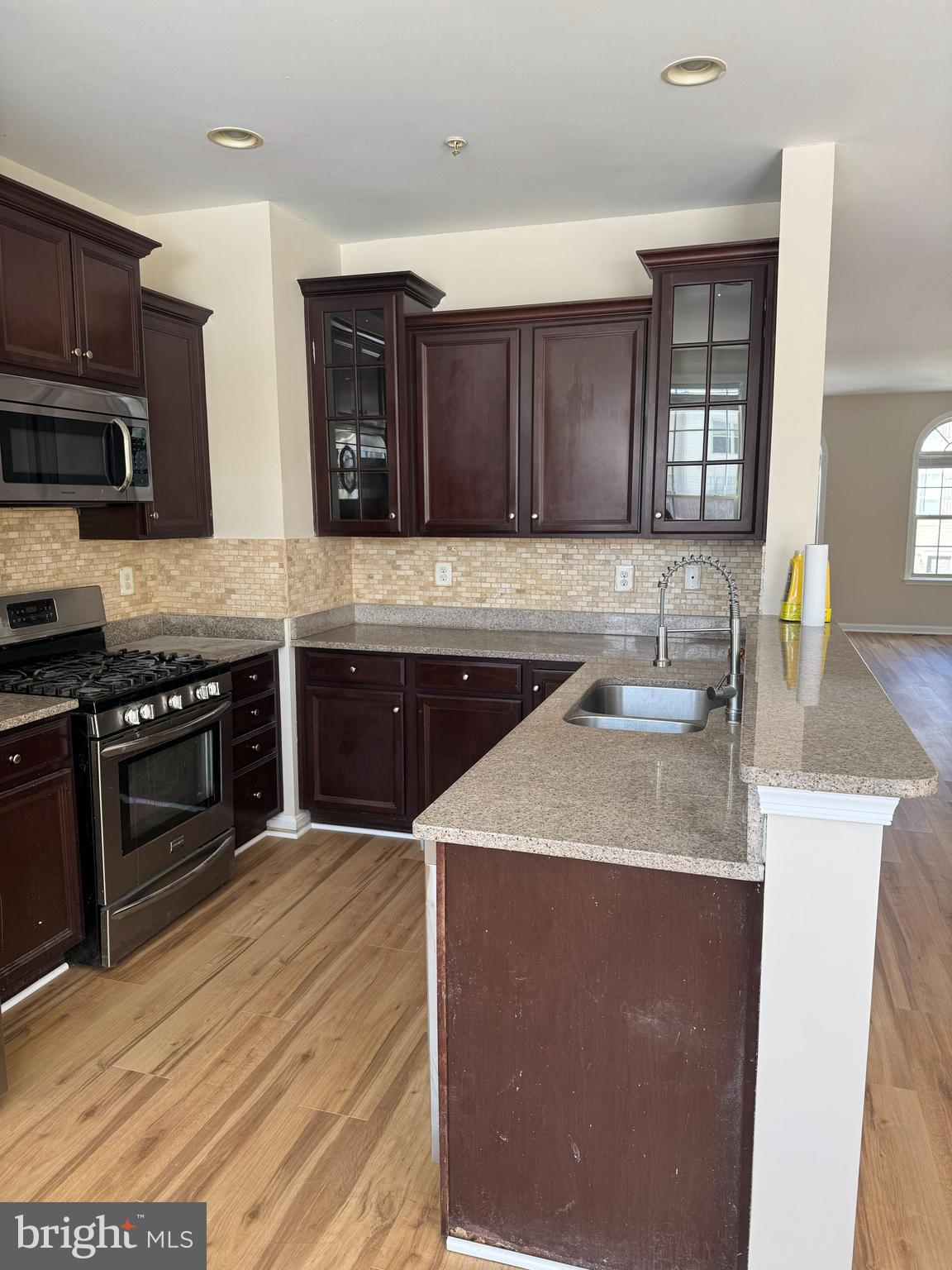 4713 Cambria Road Frederick, MD 21703 - Photo 5 of 67 a kitchen with stainless steel appliances granite countertop a sink dishwasher stove and oven