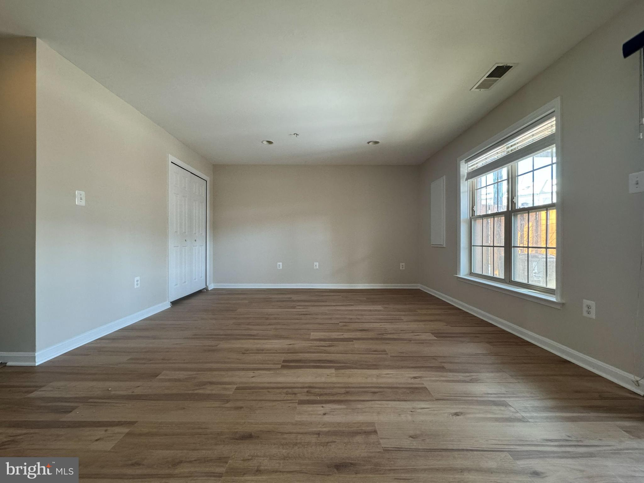 4713 Cambria Road Frederick, MD 21703 - Photo 59 of 67 wooden floor in an empty room with a window