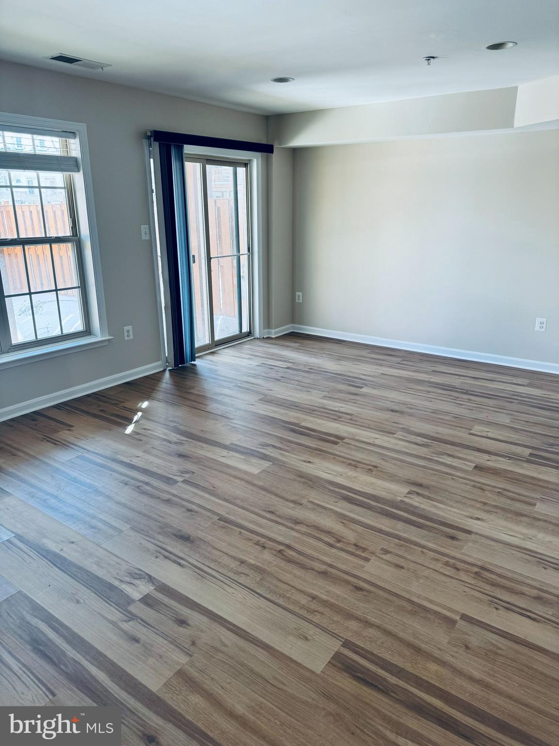 4713 Cambria Road Frederick, MD 21703 - Photo 64 of 67 wooden floor in an empty room with a window