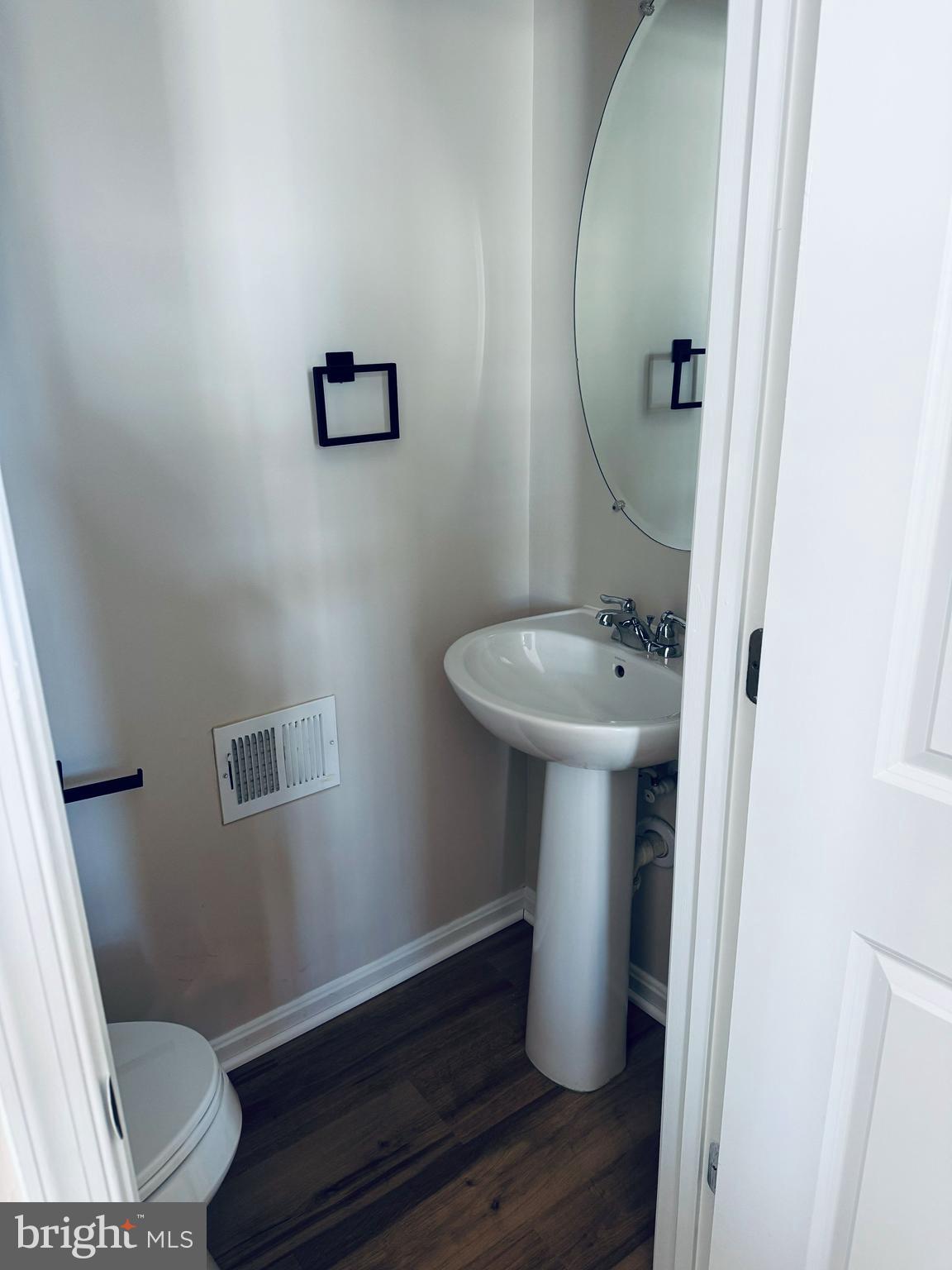 4713 Cambria Road Frederick, MD 21703 - Photo 65 of 67 a bathroom with a sink and a mirror