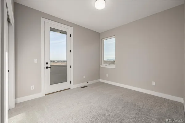 an empty room with windows