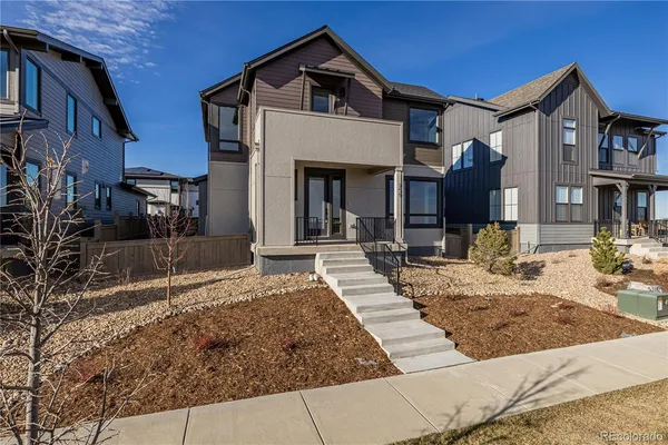 a front view of a house with entertaining space