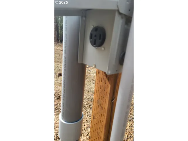 a picture of a bathroom with mirror and shower