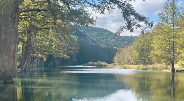 a view of lake with green space