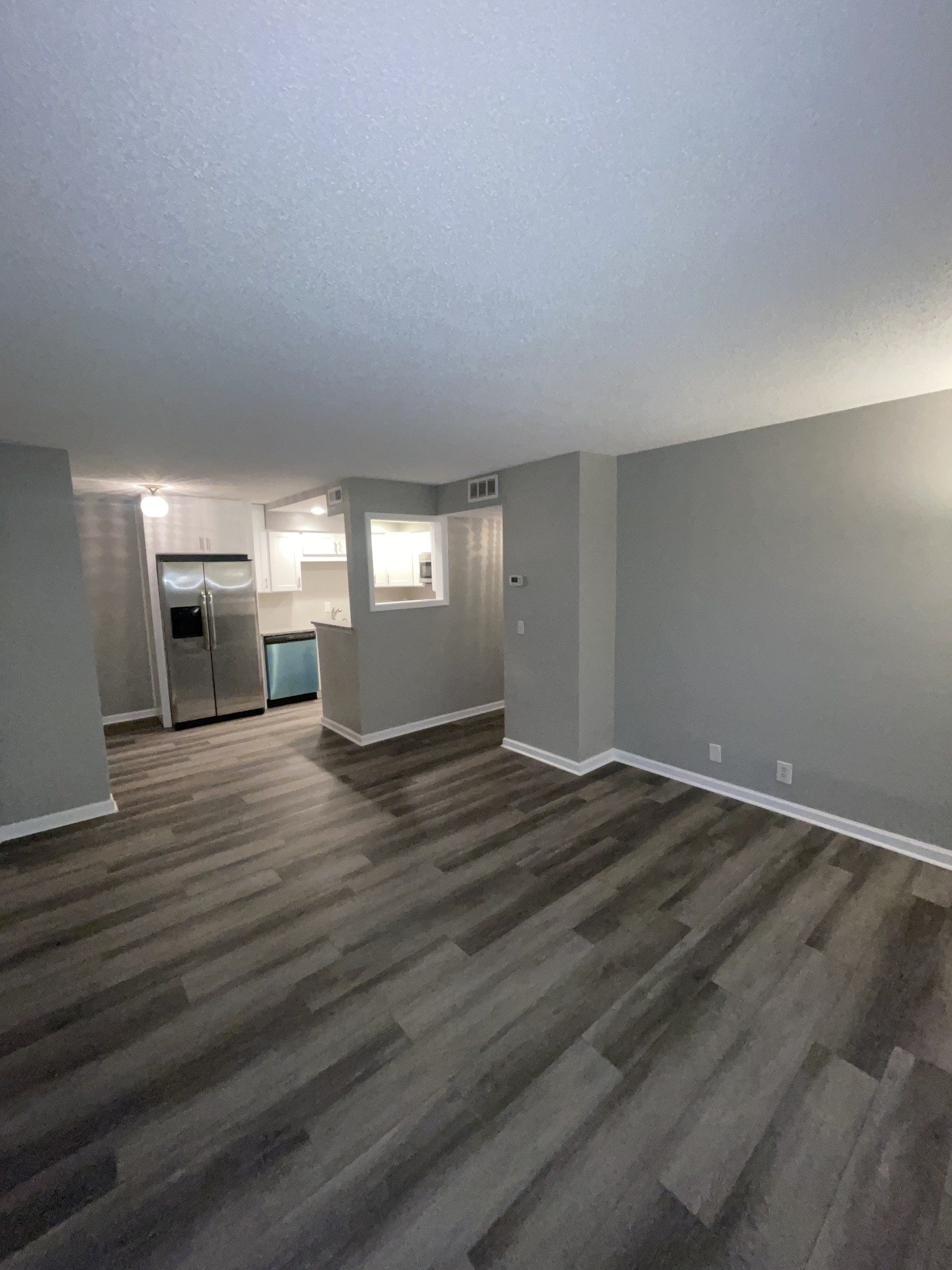 500 Paragon Mills Road, Unit N7 Nashville, TN 37211 - Photo 11 of 21 a view of empty room with kitchen and window